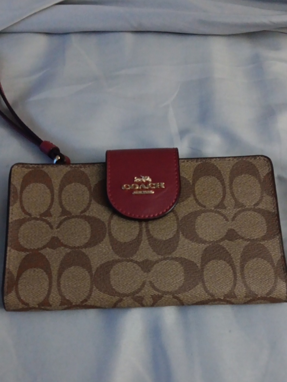 Coach Signature Canvas Wristlet in Brown with Red Tab